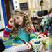 Girl scout Violet Dudley writes a letter to a New Hope Baptist Church blanket recipient on Tuesday, Jan. 22. Daniel Brenner I AnnArbor.com